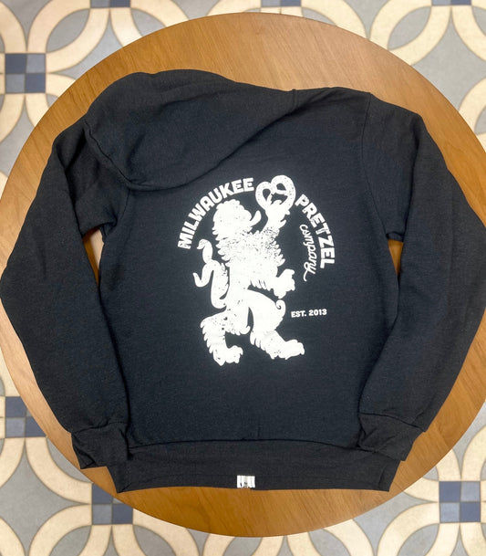 Black Milwaukee Pretzel Company zip up hoodie featuring our famous Bavarian Beast