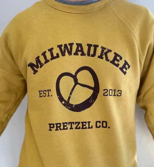 Milwaukee Pretzel Company crewneck fleece-lined sweatshirt in mustard yellow